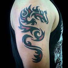 60 Tribal Dragon Tattoo Designs For Men Mythological Ink Ideas Dragon Tattoo Tribal Dragon Tattoo Designs Dragon Tattoo Designs