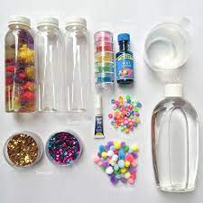 1) you need baby oil, water, food coloring, sequins, glitter, or small beads, duct tape, and a few baby bottles. Diy Discovery Bottles See Previous Post Bottle 1 Baby Oil Pom Poms Glitter Bottle 2 Baby Oil Baby Toys Diy Discovery Bottles Diy Sensory Toys