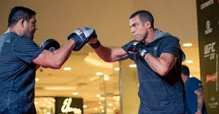 Boxing is a combat sport in which two people, usually wearing protective gloves and other protective equipment such as hand wraps and mouthguards. Vitor Belfort Meets The Real Tarzann In Boxing Match At Triller Event On June 19 Mma Fighting