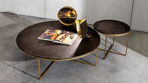 The toronto round coffee table stands on thick square posts at 19h and has a 42 round top that is finished with a catalyzed conversion varnish to help resist water and wear. Piktor Round Coffee Table In Glass And Metal Sovet