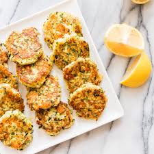 Season with salt and pepper. Moisture Laden Zucchini Can Be Soggy And Bland When Pan Fried This Mediterranean Recipe Produces A Crisp Highly Flavored F Zucchini Fritters Fritters Recipes