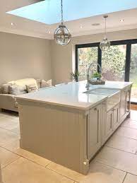 It's very easy to understand why people love them so much; Light Grey Shaker Kitchen Carrara Quartz Bifold Doors Cornforth White Grey Shaker Kitchen Open Plan Kitchen Diner Small Kitchen Decor