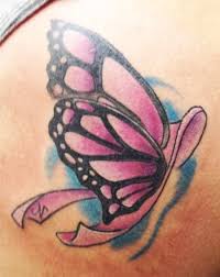 Ribbon tattoos are versatile pieces of art that can be used to carry different ideas. Untitled Tattoos Butterfly Tattoo Designs Cancer Tattoos Ribbon Tattoos