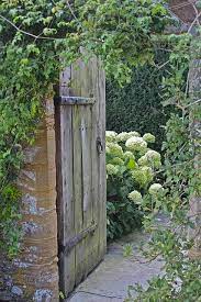 Escolha entre premium de old wooden garden door da melhor qualidade. England The Tour Garden Doors Garden Gates Garden Entrance