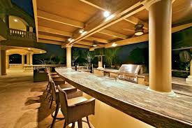 A custom pergola covered with a tinted polycarbonate roof is the perfect solution for those with a desire for natural light in an outdoor kitchen. 7 Outdoor Kitchen Ideas And Tips Home Matters Ahs