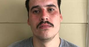 Police arrest Corcoran man with felony warrant