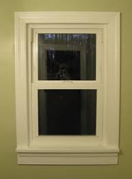 Window and door trim does not like to be mitered. Bathroom Renovation How To Install Baseboards Trim Young House Love