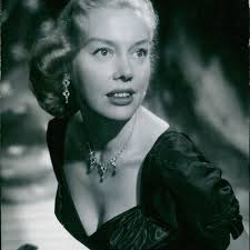 Mrs. Michaela Denis and her husband Armand Denis, explorers and photog