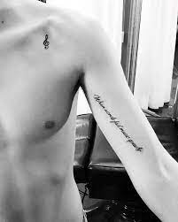 Music Note With Quote Guys Simple Chest Tattoo Inspiration Music Tattoos Minimalist Tattoo Simple Music Tattoo