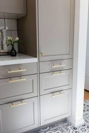 The transitional kitchen's masterpiece is the gorgeous hood with a great island! 280 Grey Kitchen Cabinets Ideas Grey Kitchen Cabinets Grey Kitchen Kitchen Cabinets