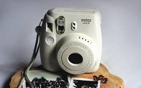 Bride and groom in photo booth at the asbury hotel. Top 3 Best Polaroid Cameras For Weddings Guest Books Geartacular