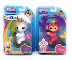 Wowwee Fingerlings Both Pink Bella Monkey And Unicorn Gigi Is Exclusive Only For Toys R Us Fingerlings Respond To Your Kisses Baby Monkey Hot Toys Toys R Us