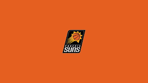 The logo features a gold basketball with a white border that has spikes tailing to the right, this makes it look like flames. Hd Wallpaper Basketball Phoenix Suns Logo Nba Wallpaper Flare