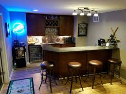 Main tv and custom wet bar area in finished basement. Finished Basement Company Basements Bars St Louis