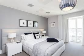 A Bedroom With Grey Wall White Furniture And Grey Carpet Floor Gray Master Bedroom Grey Bedroom Decor Light Gray Bedroom