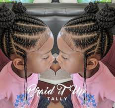 The braided hairstyle is meant to look naturally stunning while preventing damage. He Cutest Love These Double Knot Feed In Buns By Braidituptally Voiceofhaircare Com With Kids Hairstyles Girls Kids Hairstyles Kids Braided Hairstyles