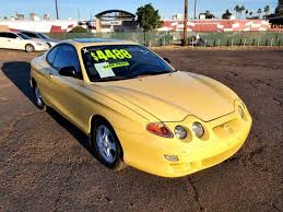 Image result for Pastel Yellow 2000 Tiburon