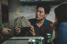 Greed and class discrimination threaten the newly formed symbiotic relationship between the wealthy park family and the destitute kim clan. Filmbulletin Parasite