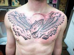 Praying Hands Tattoo Tattoo Designs With Meaning Praying Hands Tattoo Design Chest Piece Tattoo