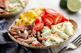 Because most pulled pork recipes don't require prime cuts of meat, pulled pork is a cheaper meat option and ideal for serving a large crowd. Pulled Pork Bowls With Avocado Slaw