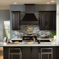 Painting your kitchen cabinets is the single most transformative thing you can do to your kitchen without a gut renovation. Dark Brown Kitchen Cabinet Colors Teracee