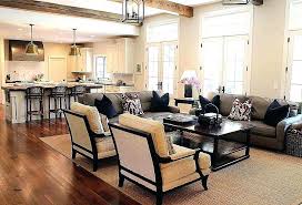 The traditional residence by staples design group was envisioned the whole open floor plan as a bright and inviting space and the kitchen was designed with white cabinetry and beige accents. Kitchen Open Floor Plan Furniture Layout Ideas Novocom Top