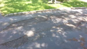 Fixing small driveway cracks is a simple diy job that can be done the best way to prevent asphalt cracks is through sealcoating. Large Cracks Depressions In Asphalt Driveway Home Improvement Stack Exchange