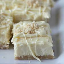 Totally uncomplicated but totally delicious, this white chocolate cheesecake one is in my personal top 5 favourite cheesecake flavours. White Chocolate Cheesecake Bars With Lemon Zest And Shortbread Crust