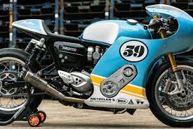 The Supercharged Thruxton Leading The Sultans Of Sprint Triumph Thruxton Cafe Racer Motorcycle Bike