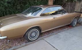 Image result for Sierra Tan 1965 Corvair