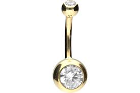 Carat gold which is often misspelled for karat gold or k gold price when it comes to referring to precious metals that is. 18 Carat Gold Bananabell 2 Crystals Piercings