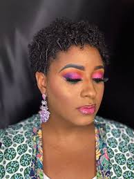 HoliSlay with the beautiful and photogenic Ms. Maxine Norman I did a few  weeks ago. A black Smokey eye, with a touch of gold in the inner corner,  and a shiny red