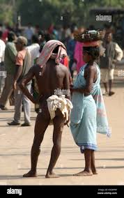 Orissa North East people man (naked) woman tribe tribal indigenous rural  Desia Kondh weekly market lifestyle culture economy Stock Photo - Alamy