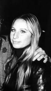 I-I love the colorful clothes she wears And the way the sunlight plays upon  her hair