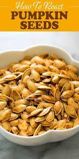 Roasted Pumpkin Seeds Super Easy Recipe Pumpkin Seed Recipes Easy Halloween Snacks Roasted Pumpkin Seeds