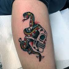 Guys Traditional Skull With Snake Tattoo Design On Leg Tattoo Designs Mexican Skull Tattoos Skull Tattoo