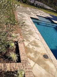 If the chemicals in your pool fall out of balance and the water becomes cloudy or unsuitable for use, an acid wash is needed. Acid Stained Saw Cut Pattern For Pool Deck Craftsman Pool Houston By Allure Construction Concrete Houzz