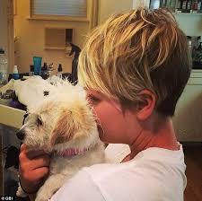Kaley cuoco with her hair cut short into a pixie in kaley cuoco new short haircuts view photo 9 of 20. Kaley Cuoco Curls Up In Dog Cage With Pet Pooch Daily Mail Online