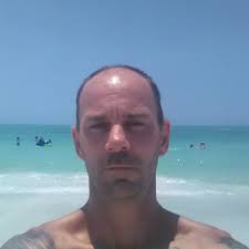 Trimming tree branches above a driveway in Walter Hill area