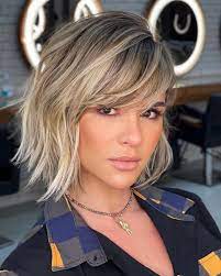 Versatile blonde blunt bob with side swept bangs and subtle highlights. 17 Best Blunt Cut Bob Haircuts For Every Face Shape