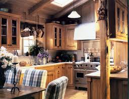 This peninsula matches the hardwood flooring as well as the exposed wooden beams of the ceiling. Off The Grid Cabin Kitchen Cabin Kitchens Farmhouse Kitchen Design Home Kitchens