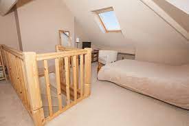 Just because the room is small doesn't mean the bed has to be. Attic Bedroom Small Loft Conversion Ideas Uk Novocom Top