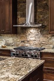 Gently wipe the panel with soap and. Stacked Stone Backsplash And Stainless Steel Range Hood Rustic Kitchen Backsplash Stone Backsplash Kitchen Diy Kitchen Backsplash