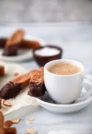 Dip in vegan dark chocolate for a decadent touch. Easy Crunchy Gluten Free Amaretto Biscotti Christmas Cookie Recipes