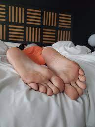 Licking sleepy feet