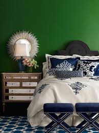 The stool is from pier 1 imports, the white vase is from the end of history, and the pho­tograph reflected in the mirror is by dariusz klimczak. Decorating With Emerald Green Green Decorating Ideas Hgtv