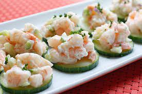 Chopped cooked shrimp (crabmeat or a mixture mix curry powder and oil with yogurt, then combine with remaining ingredients, reserving 2 tablespoons of the scallions to garnish the top of the salad. Shrimp Salad On Cucumber Slices Skinnytaste