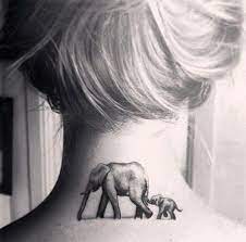 55 Attractive Back Of Neck Tattoo Designs For Creative Juice Elephant Tattoos Baby Elephant Tattoo Back Of Neck Tattoo