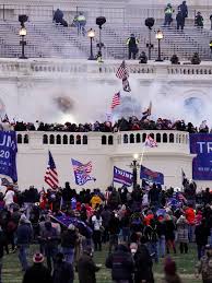 Jake angeli) of arizona—who authorities say is the man widely photographed wearing buffalo horns and fur while storming shirtless through the capitol—was. Ecoodje0l7urm