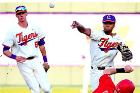 The jersey was orange with white pants and two thick orange stripes going down the sides of the legs. Clemson Baseball Jersey Www Syncro System Bg